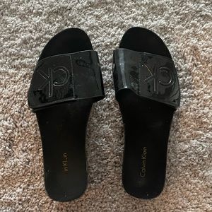 Black Calvin Klein slides size 7